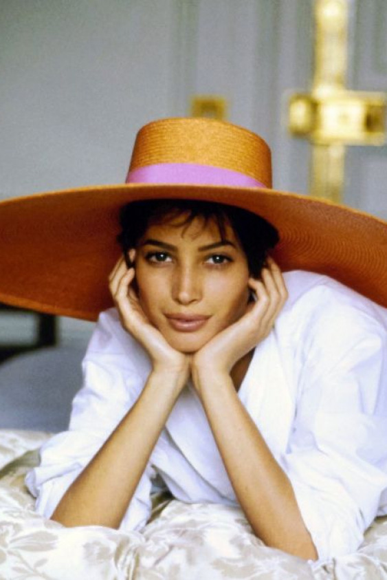 Christy Turlington in an Yves Saint Laurent Hat, Vogue, June 1990